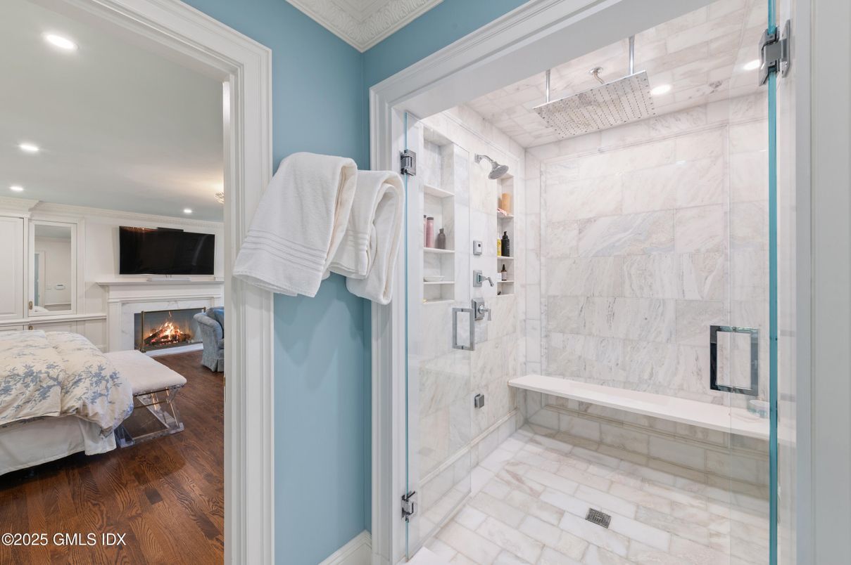 Bathroom, Bedroom, Fireplace, Glass Shower, Interior, Marble, Marble Walls, Recessed Lighting, Wood Texture Flooring
