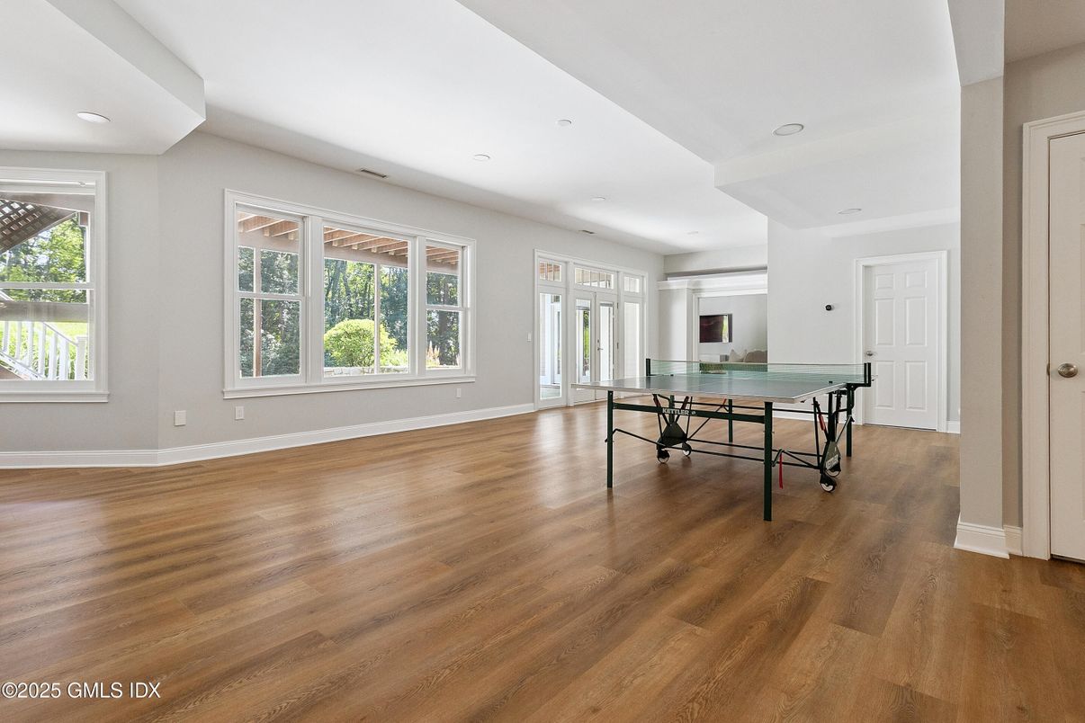 Empty room, Game Room, Interior, Recessed Lighting, Wood Texture Flooring