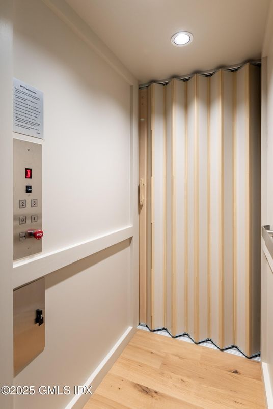 Elevator, Interior, Recessed Lighting, Wood Texture Flooring