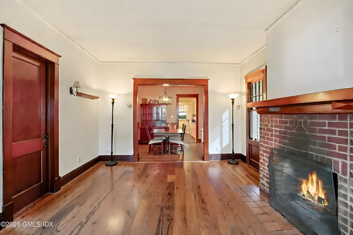 Dining room, Fireplace, Interior, Pendant Lights, Stone Walls, Wood Texture Flooring