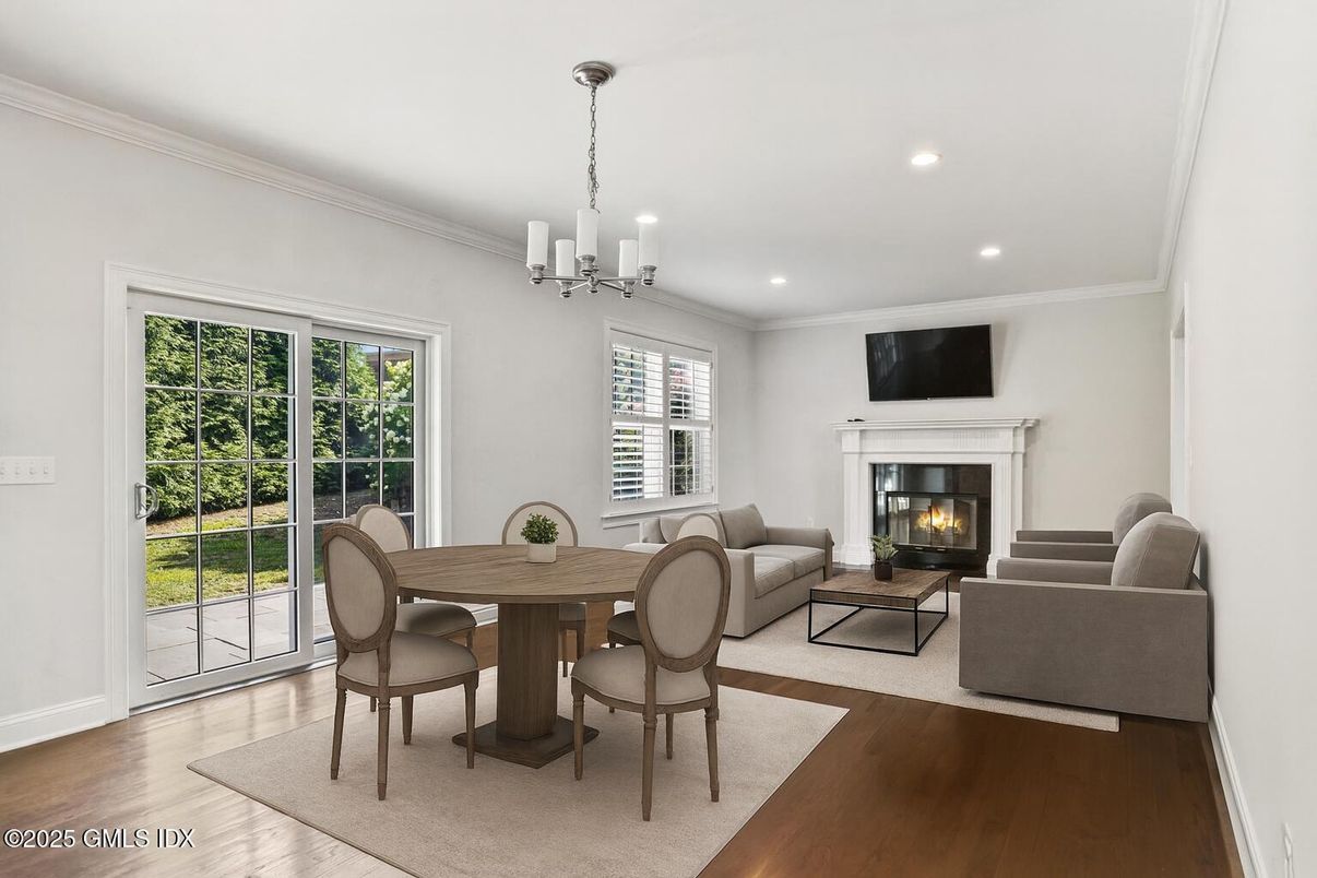 Chandelier, Dining room, Fireplace, Interior, Living room, Recessed Lighting, Wood Texture Flooring