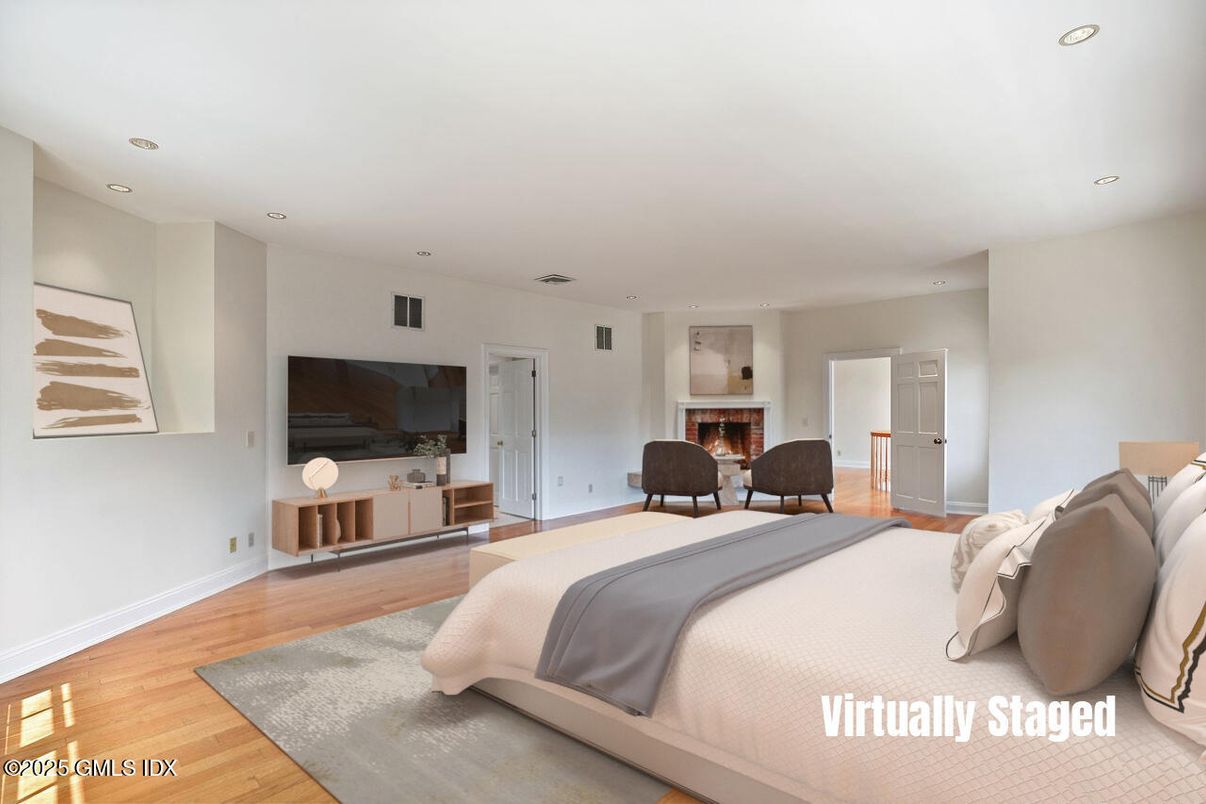 Bedroom, Fireplace, Interior, Recessed Lighting, Wood Texture Flooring