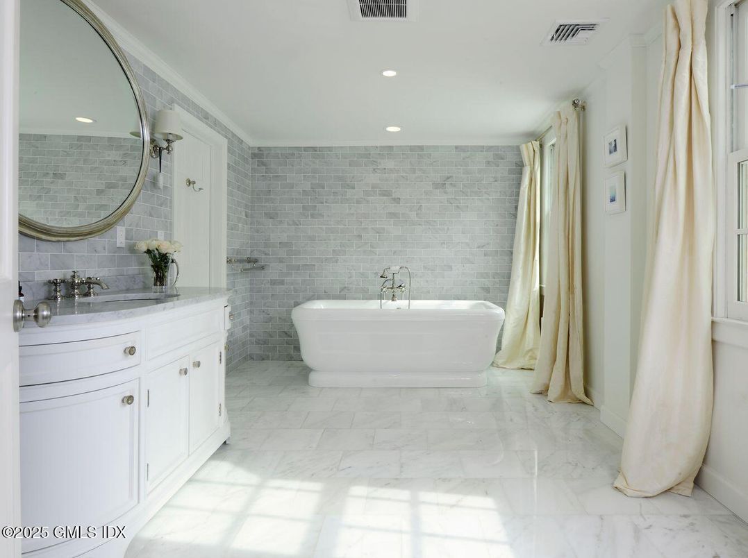 Bathroom, Free Standing Baths, Interior, Marble, Recessed Lighting, Stone Walls