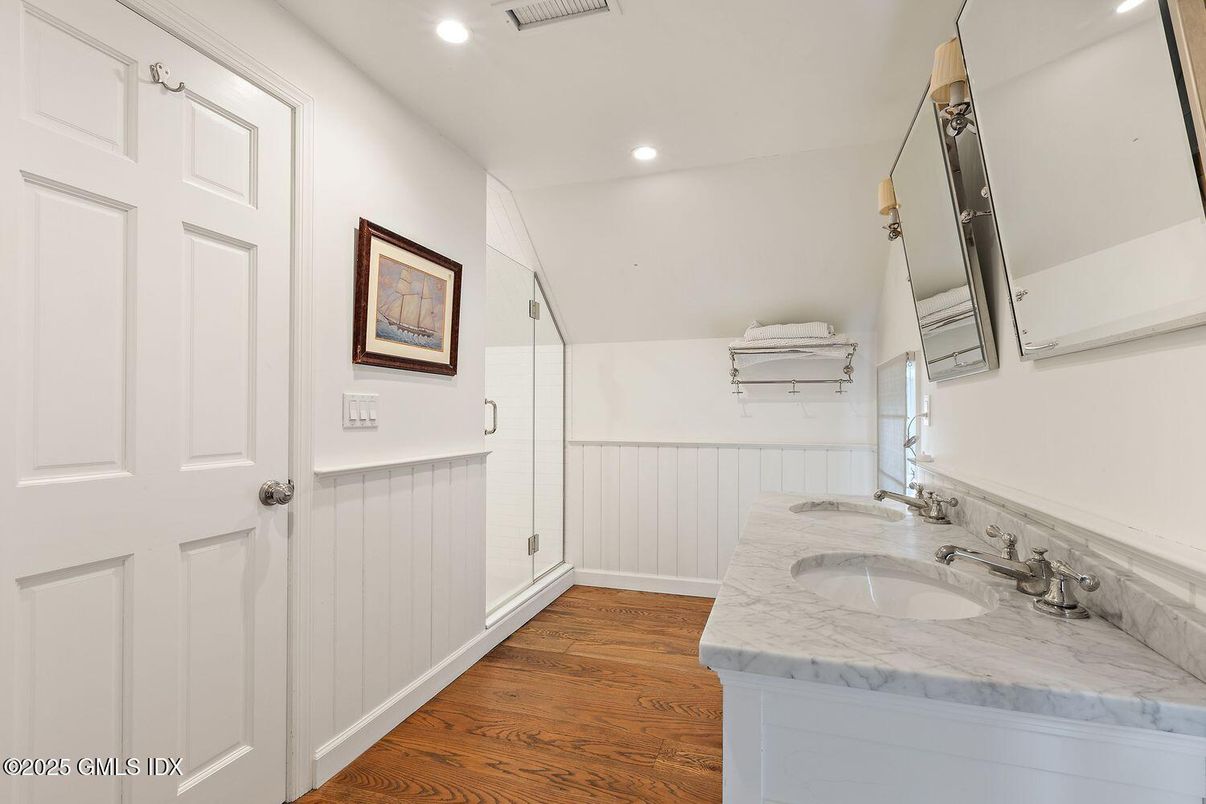 Bathroom, Dual Sink Vanities, Interior, Recessed Lighting, Wood Texture Flooring