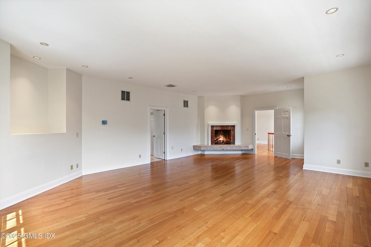 Empty room, Fireplace, Interior, Recessed Lighting, Wood Texture Flooring