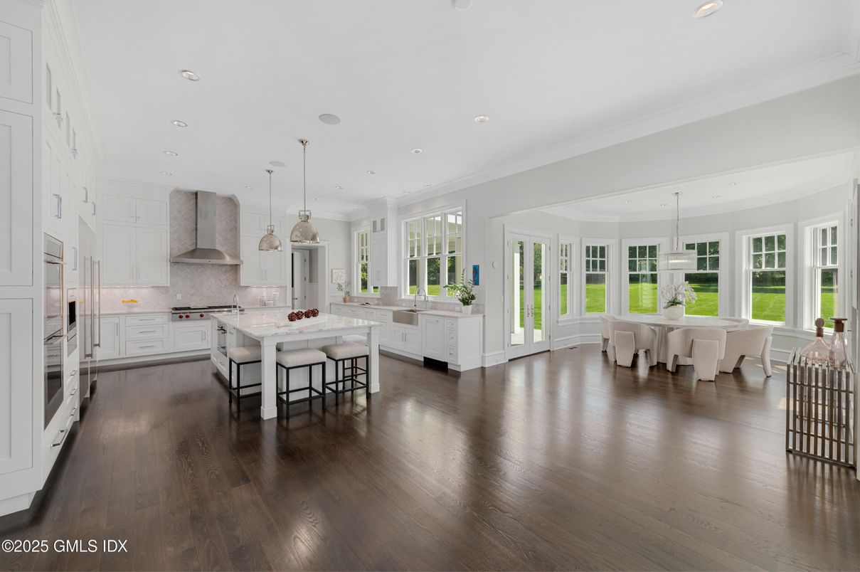 Dining room, Interior, Kitchen, Pendant Lights, Recessed Lighting, Stainless Steel Appliances, Wood Texture Flooring