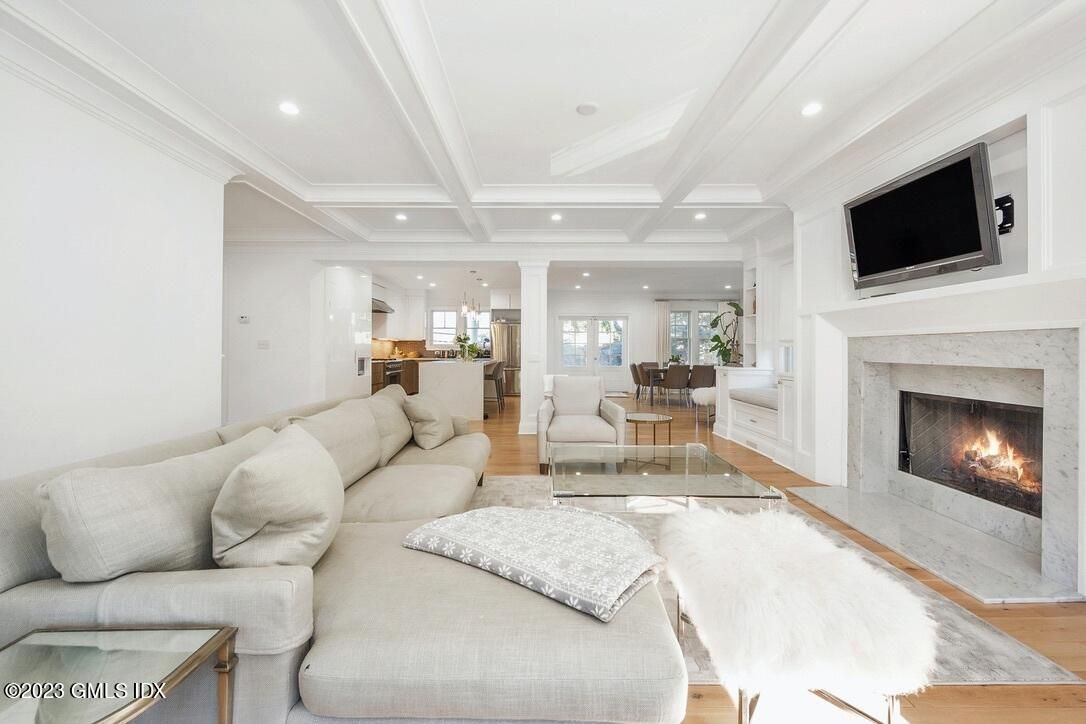 Dining room, Fireplace, Interior, Living room, Pendant Lights, Recessed Lighting, Wood Texture Flooring