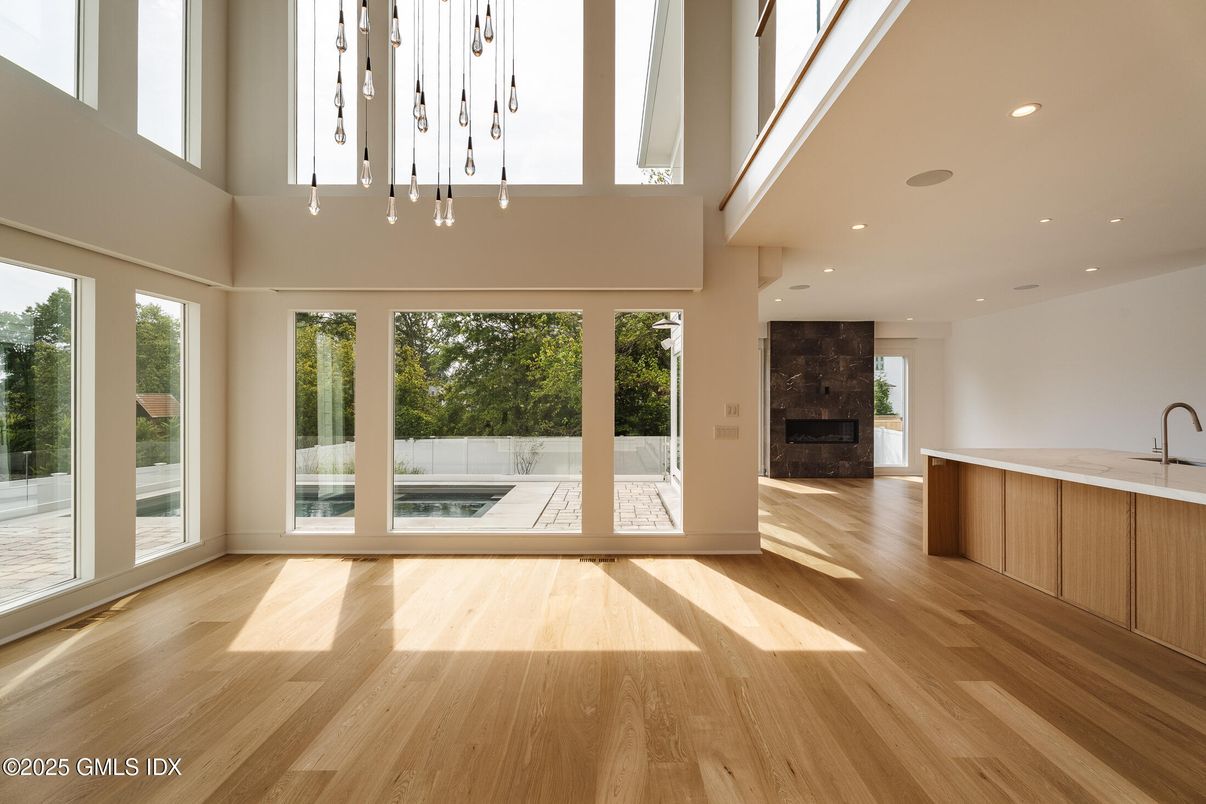 Fireplace, Interior, Pendant Lights, Recessed Lighting, Wood Texture Flooring