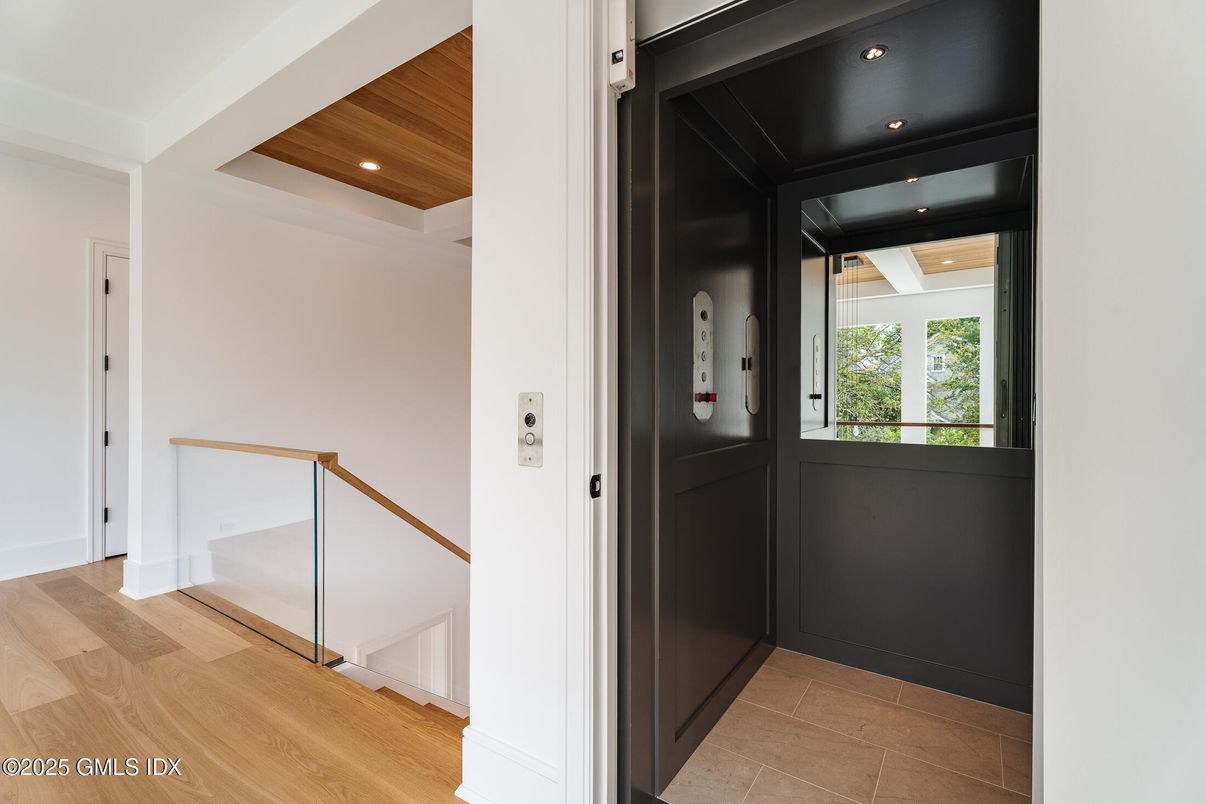 Elevator, Interior, Recessed Lighting, Wooden Ceilings, Wood Texture Flooring
