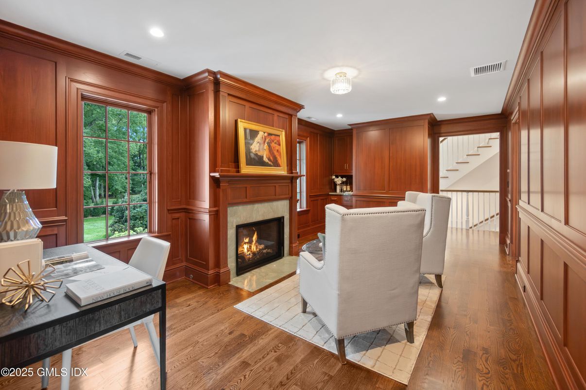 Fireplace, Home Office, Interior, Recessed Lighting, Wood Texture Flooring, Wooden Walls
