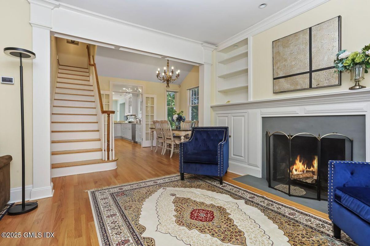 Chandelier, Dining room, Fireplace, Interior, Recessed Lighting, Wood Texture Flooring