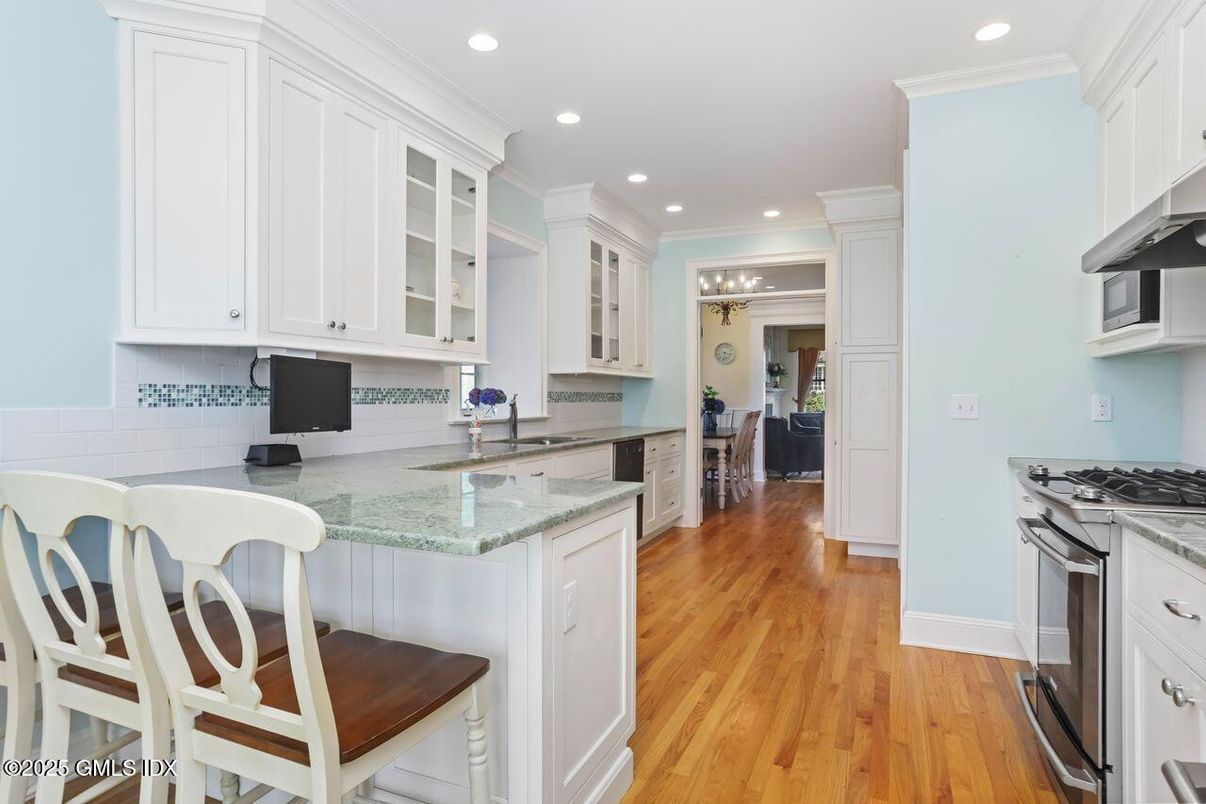 Chandelier, Interior, Kitchen, Recessed Lighting, Stainless Steel Appliances, Wood Texture Flooring