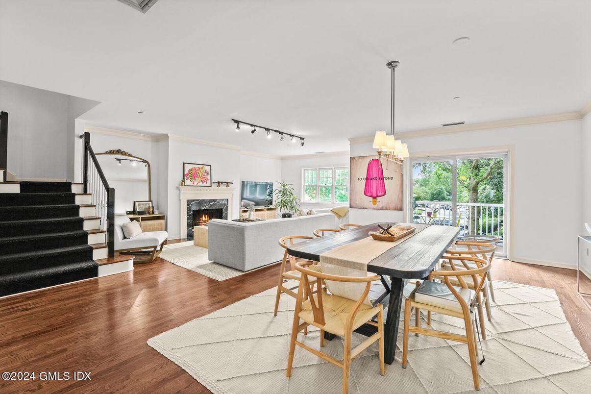 Chandelier, Dining room, Fireplace, Interior, Living room, Pendant Lights, Wood Texture Flooring