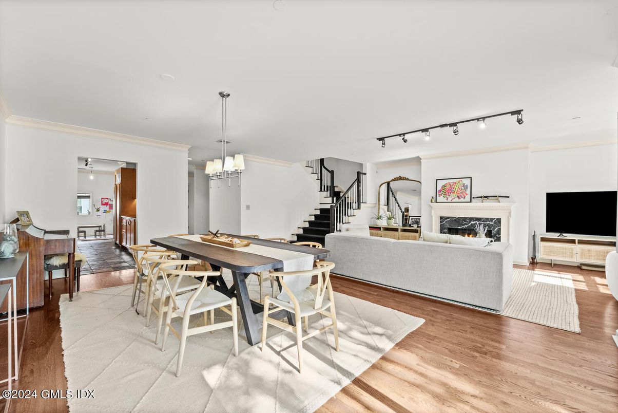 Chandelier, Dining room, Fireplace, Interior, Living room, Pendant Lights, Wood Texture Flooring