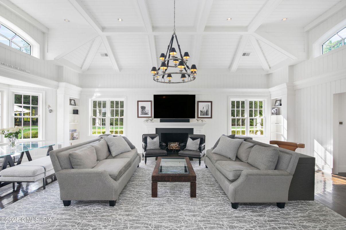 Chandelier, Fireplace, Interior, Living room, Pendant Lights, Recessed Lighting, Wood Texture Flooring