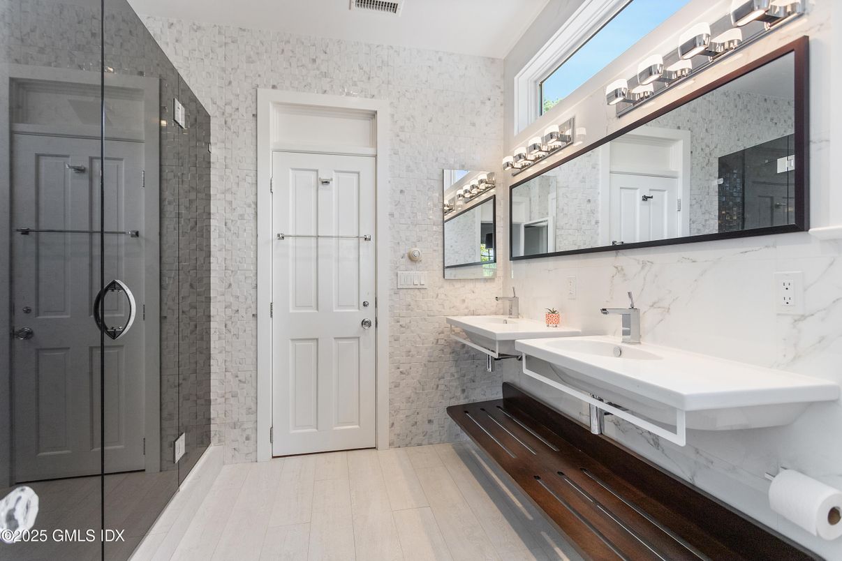Bathroom, Dual Sink Vanities, Glass Shower, Interior, Marble Walls