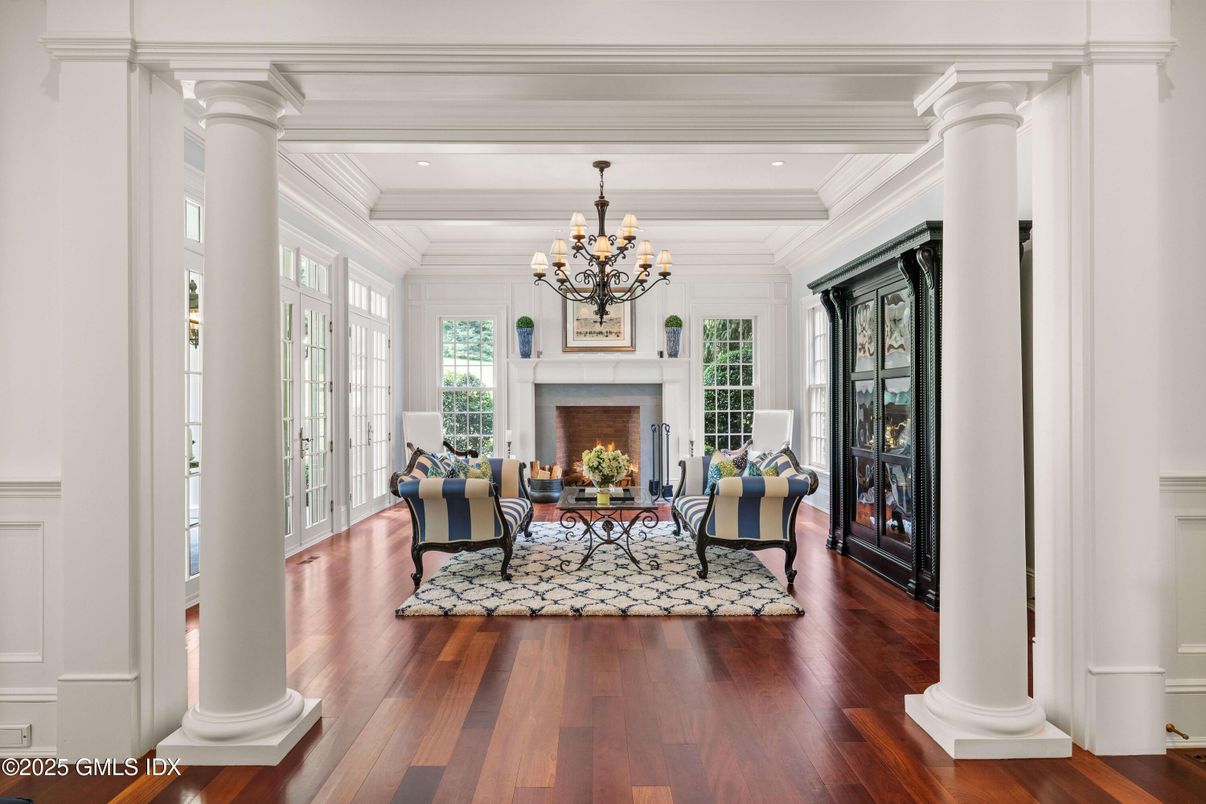 Chandelier, Fireplace, Interior, Living room, Recessed Lighting, Wood Texture Flooring