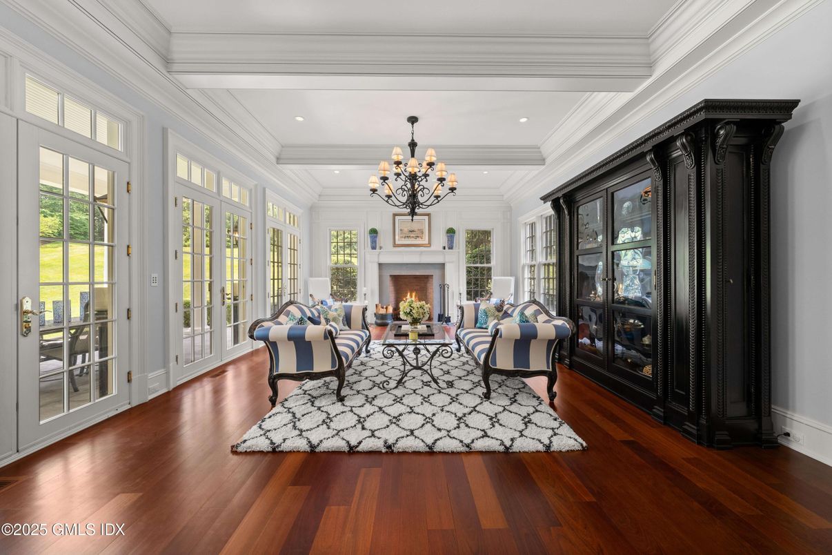 Chandelier, Fireplace, Interior, Living room, Recessed Lighting, Wood Texture Flooring