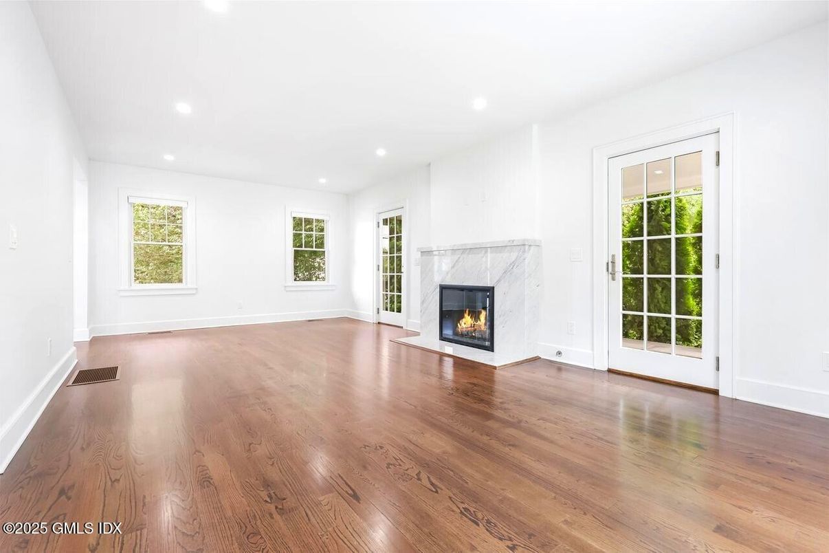 Empty room, Fireplace, Interior, Recessed Lighting, Wood Texture Flooring