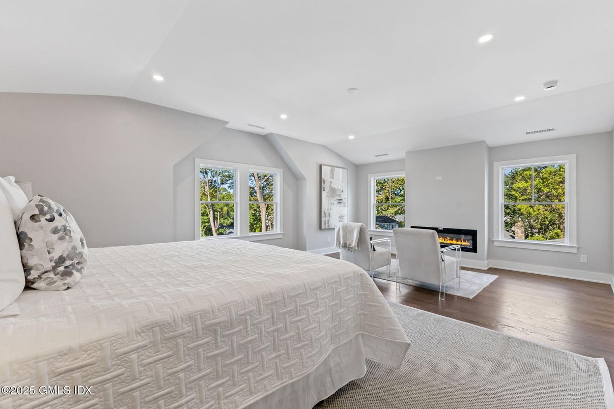 Bedroom, Fireplace, Interior, Recessed Lighting, Wood Texture Flooring