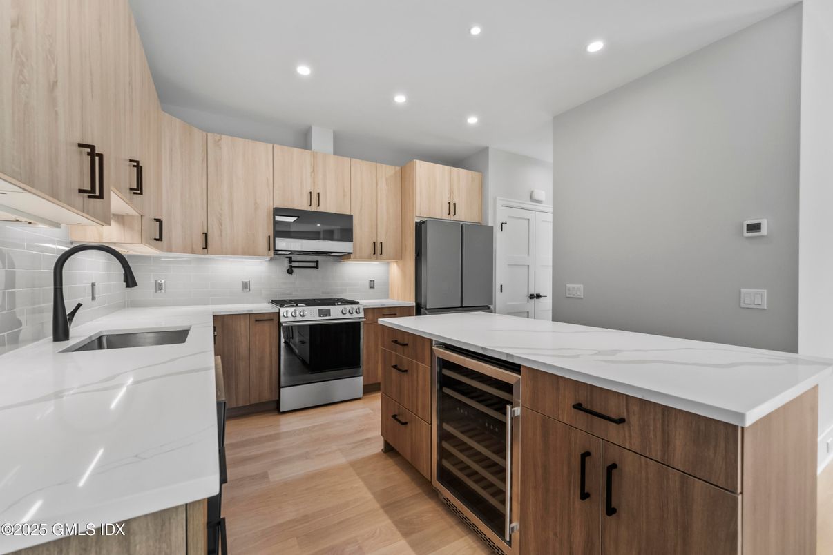 Interior, Kitchen, Recessed Lighting, Stainless Steel Appliances, Wood Texture Flooring