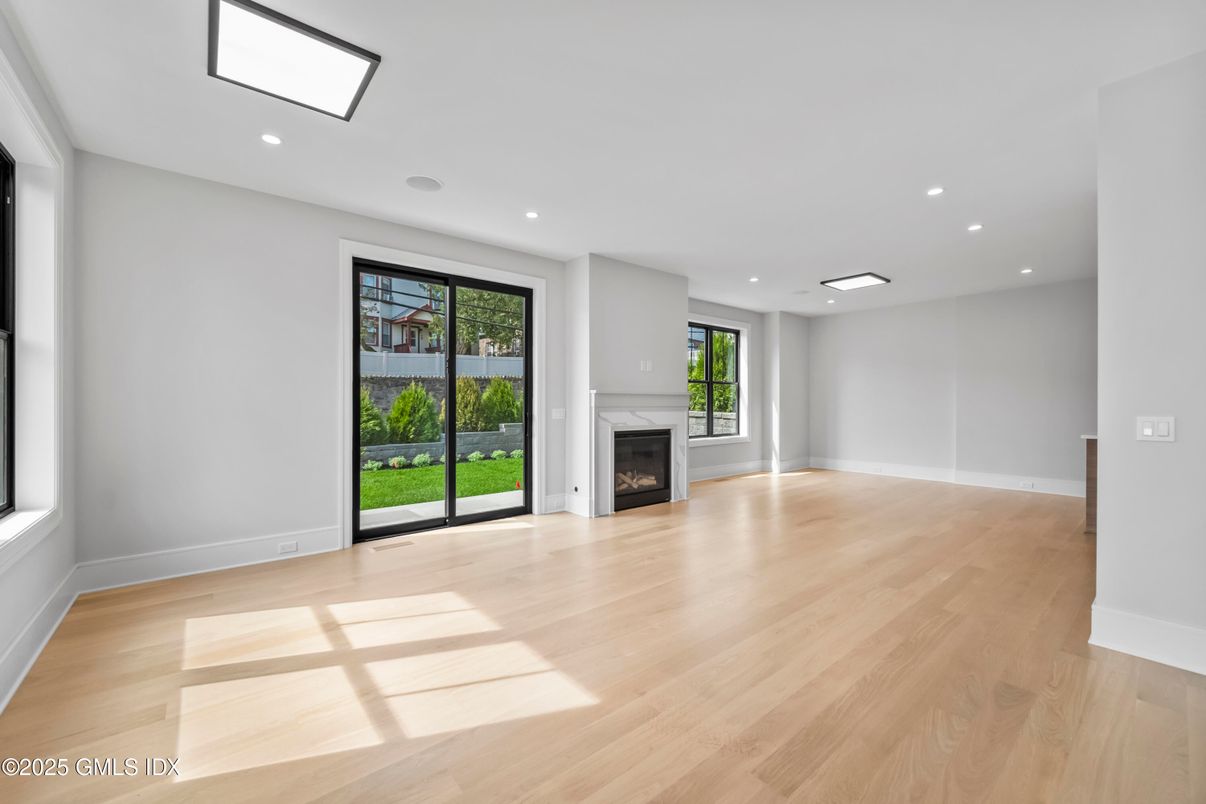 Empty room, Fireplace, Interior, Recessed Lighting, Wood Texture Flooring