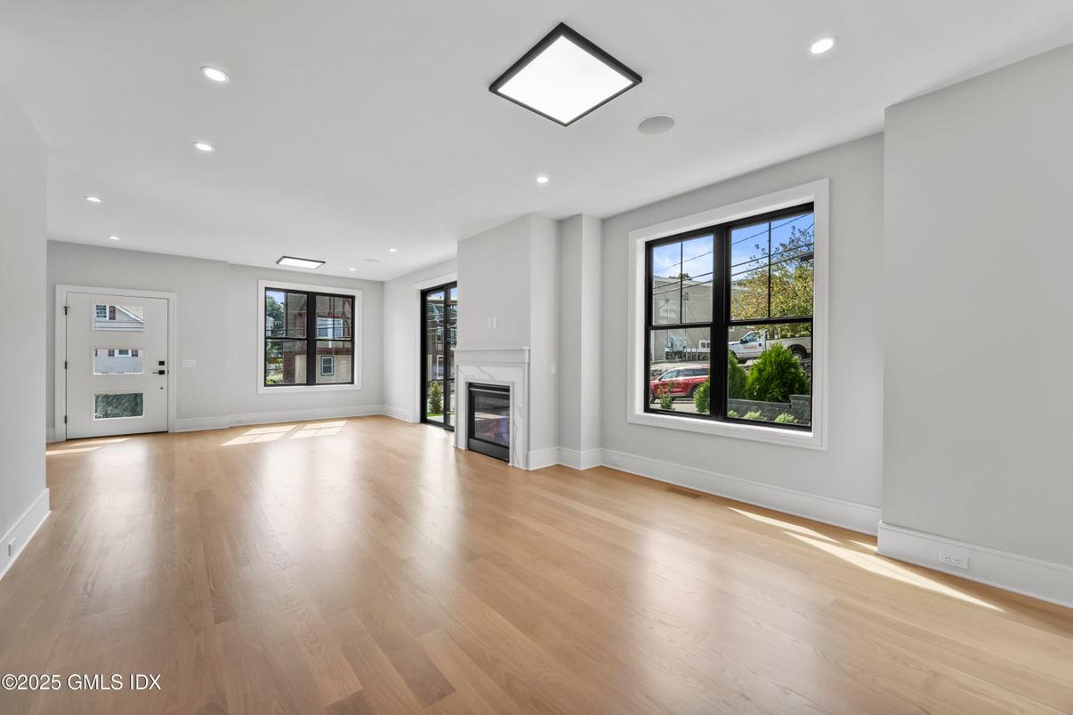 Empty room, Fireplace, Interior, Recessed Lighting, Wood Texture Flooring