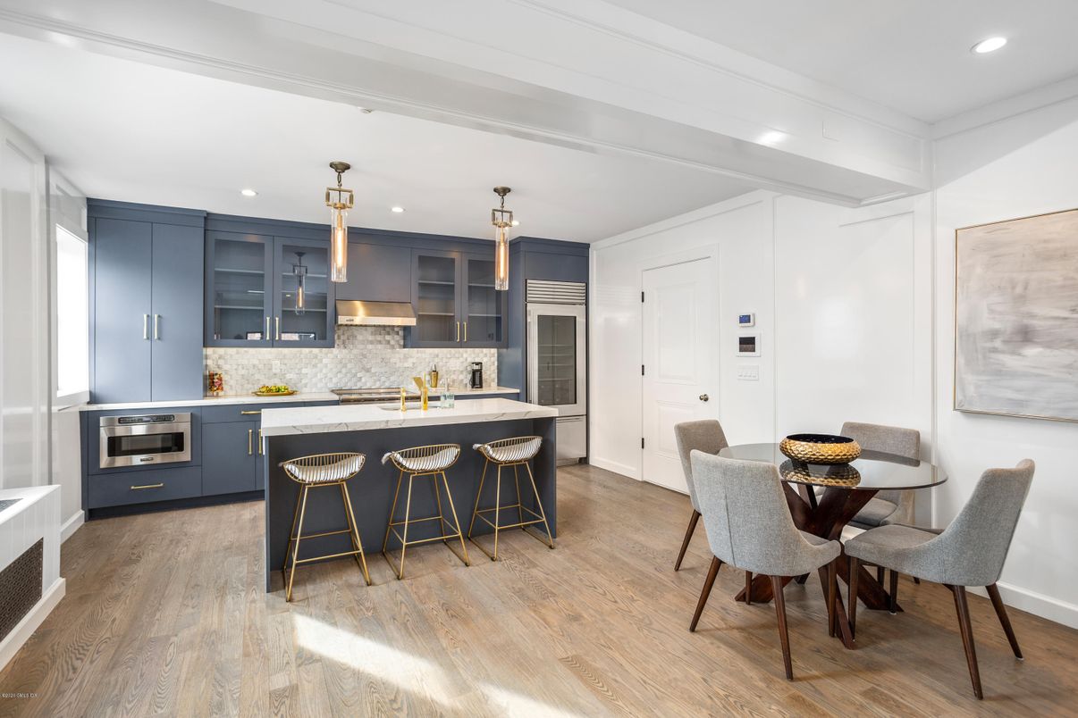 Dining room, Interior, Kitchen, Pendant Lights, Recessed Lighting, Stainless Steel Appliances, Wood Texture Flooring