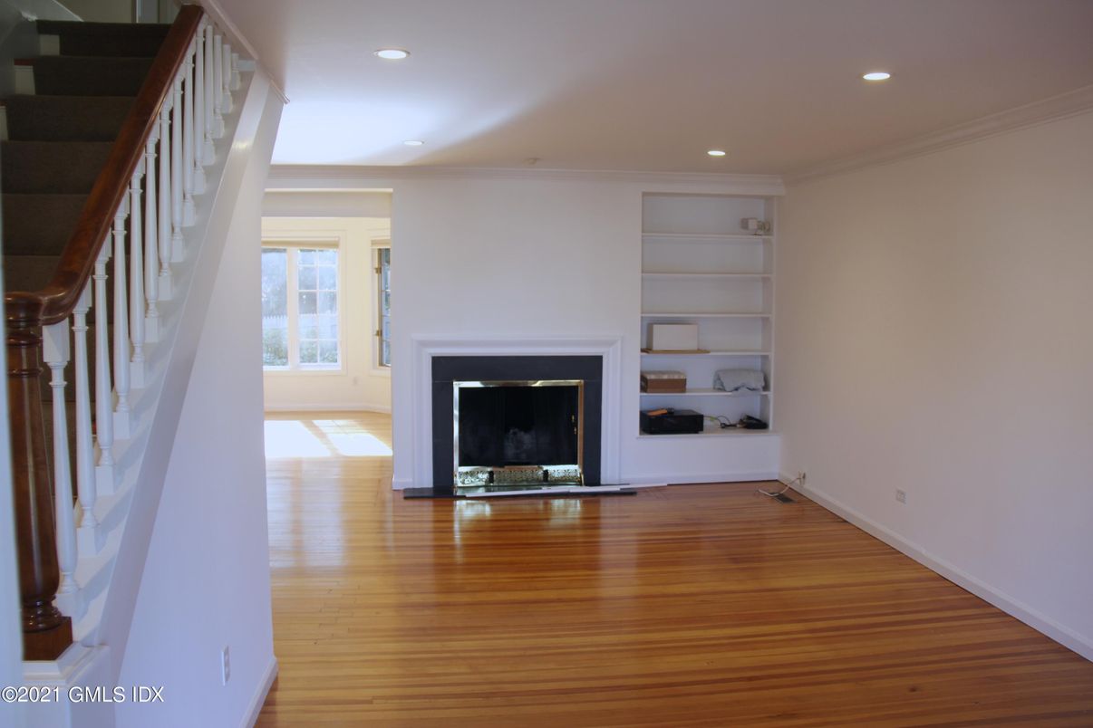 Empty room, Fireplace, Interior, Recessed Lighting, Wood Texture Flooring