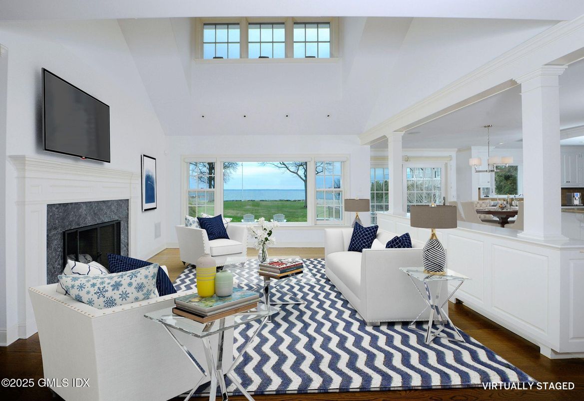 Dining room, Fireplace, Interior, Living room, Pendant Lights, Water, Wood Texture Flooring