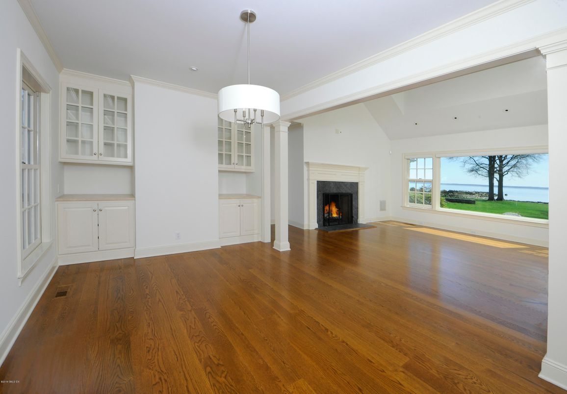 Empty room, Fireplace, Interior, Pendant Lights, Recessed Lighting, Wood Texture Flooring