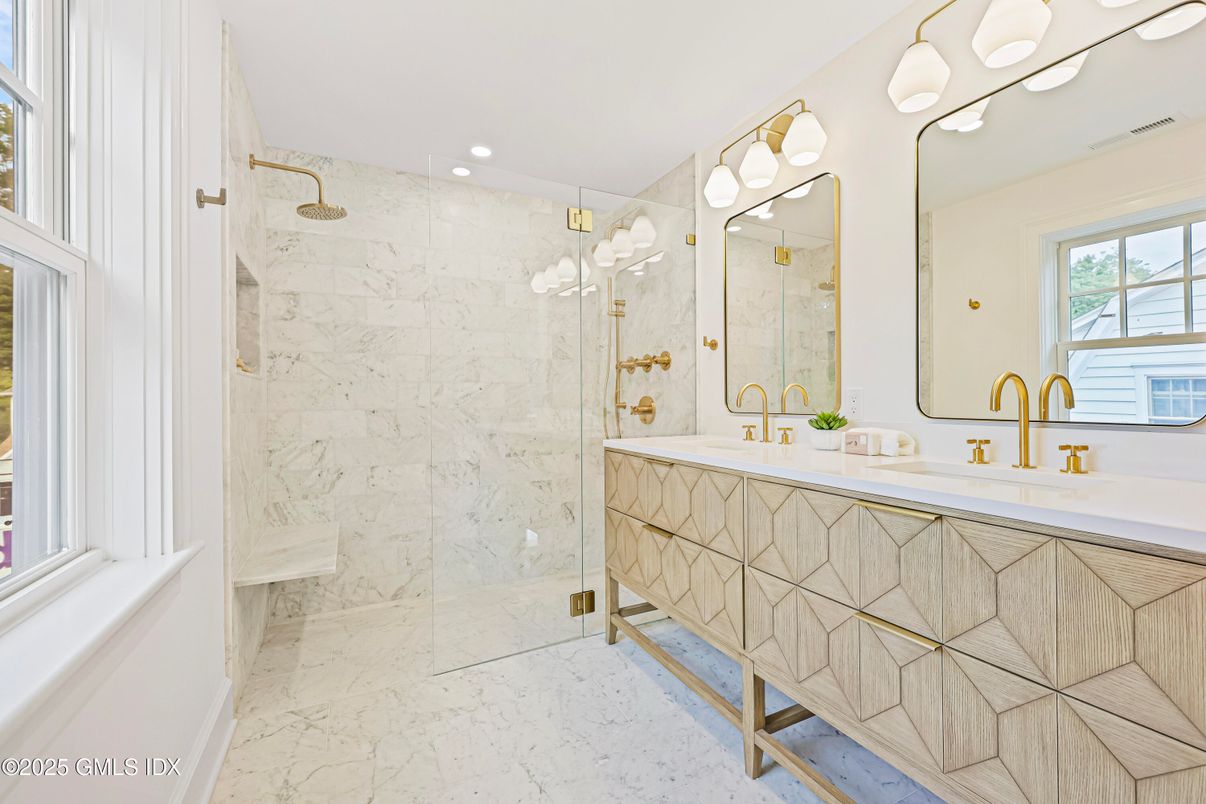 Bathroom, Dual Sink Vanities, Glass Shower, Interior, Marble, Marble Walls, Recessed Lighting