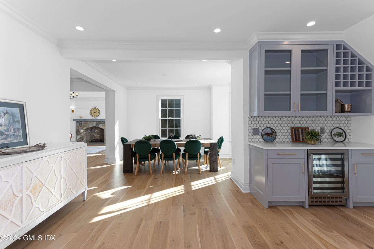 Dining room, Fireplace, Interior, Kitchen, Recessed Lighting, Wood Texture Flooring