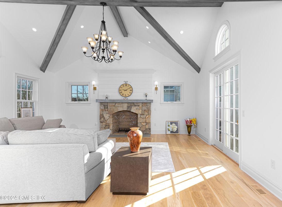 Chandelier, Fireplace, Interior, Living room, Recessed Lighting, Wooden Beams, Wood Texture Flooring