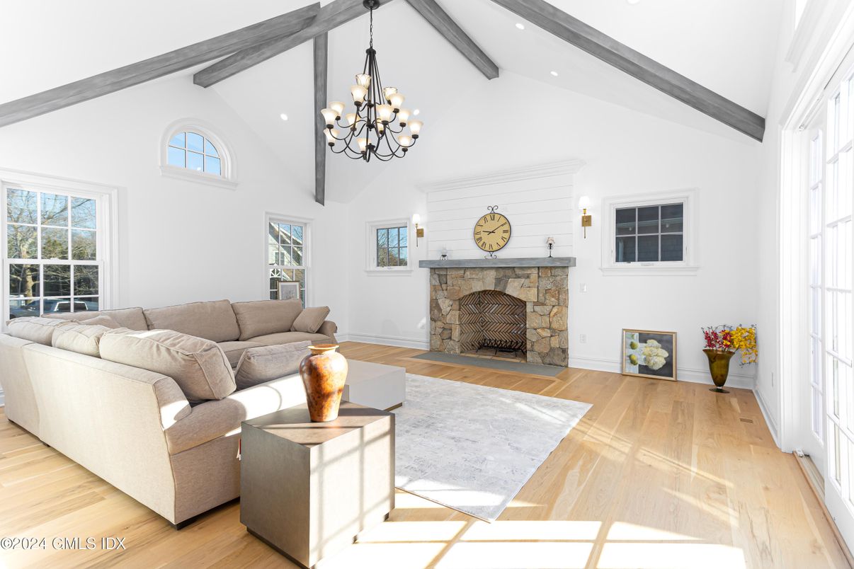 Chandelier, Fireplace, Interior, Living room, Recessed Lighting, Wooden Beams, Wood Texture Flooring
