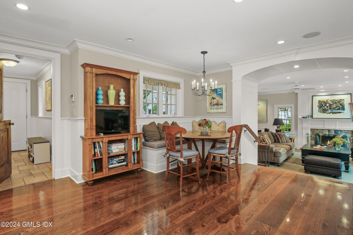 Chandelier, Dining room, Fireplace, Interior, Living room, Recessed Lighting, Wood Texture Flooring