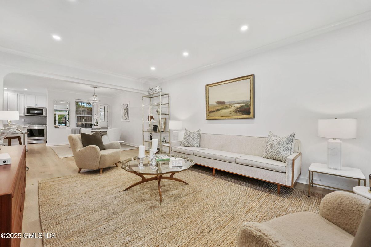 Chandelier, Dining room, Interior, Kitchen, Living room, Pendant Lights, Recessed Lighting, Stainless Steel Appliances, Wood Texture Flooring