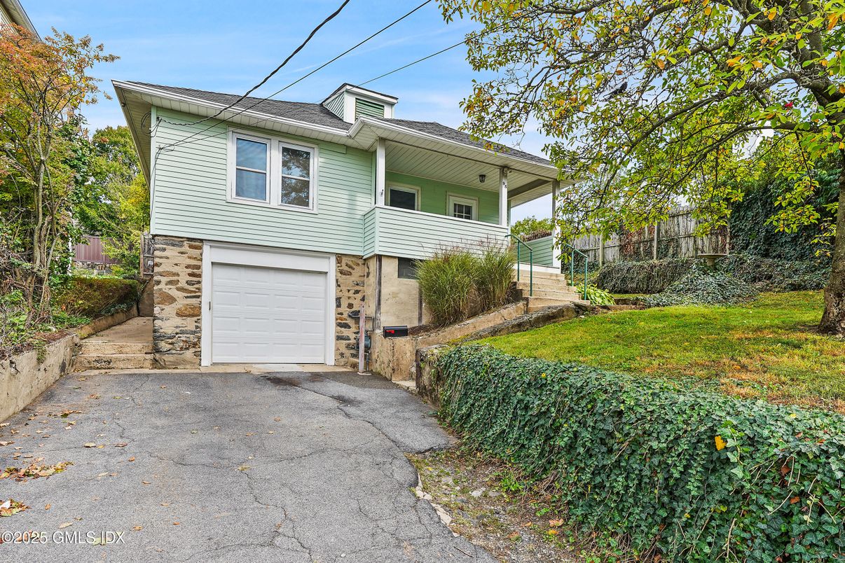 Attached, Exterior, Facade, Brick Facade, American Foursquare