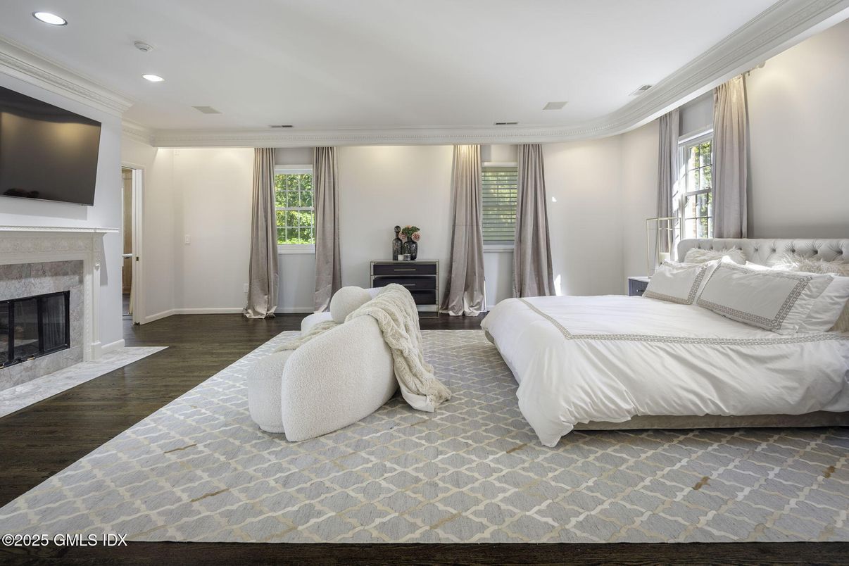 Bedroom, Fireplace, Interior, Recessed Lighting, Wood Texture Flooring