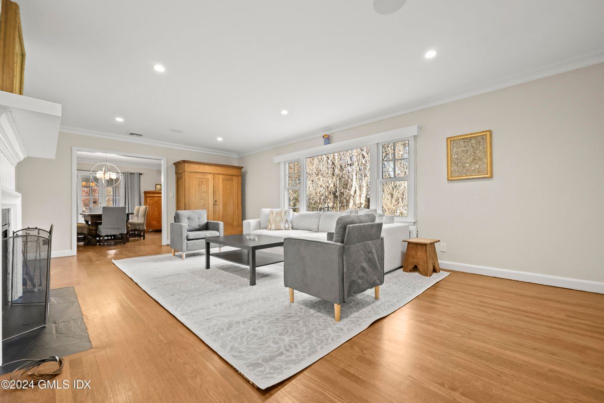 Dining room, Fireplace, Interior, Living room, Recessed Lighting, Wood Texture Flooring