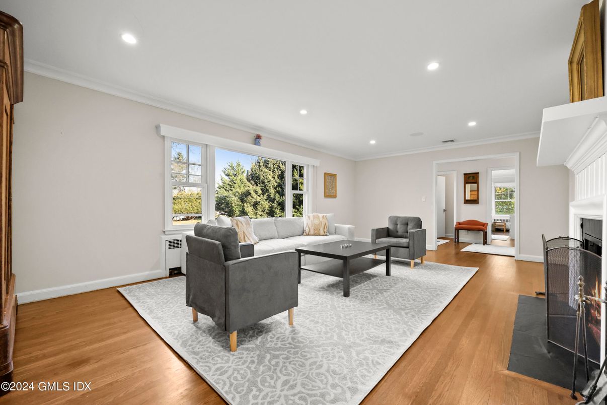 Fireplace, Interior, Living room, Recessed Lighting, Wood Texture Flooring