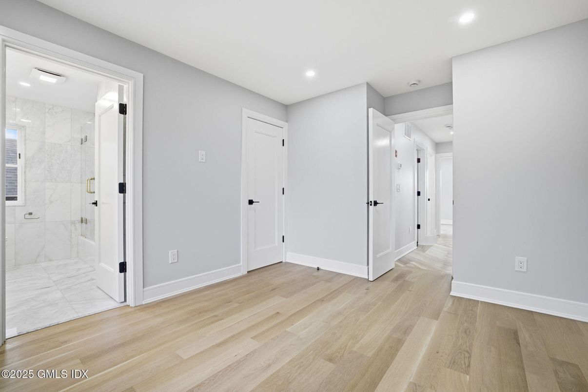 Bathroom, Empty room, Interior, Marble, Marble Walls, Recessed Lighting, Wood Texture Flooring