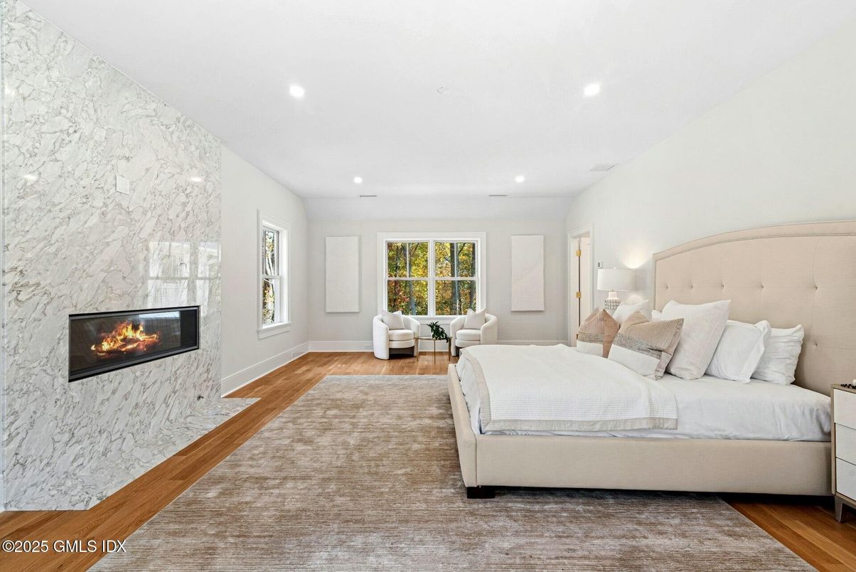 Bedroom, Fireplace, Interior, Recessed Lighting, Wood Texture Flooring