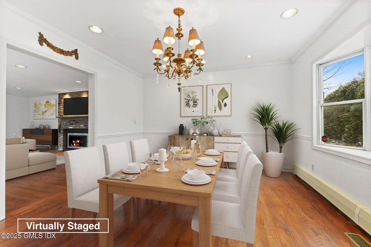 Chandelier, Dining room, Fireplace, Interior, Recessed Lighting, Wood Texture Flooring