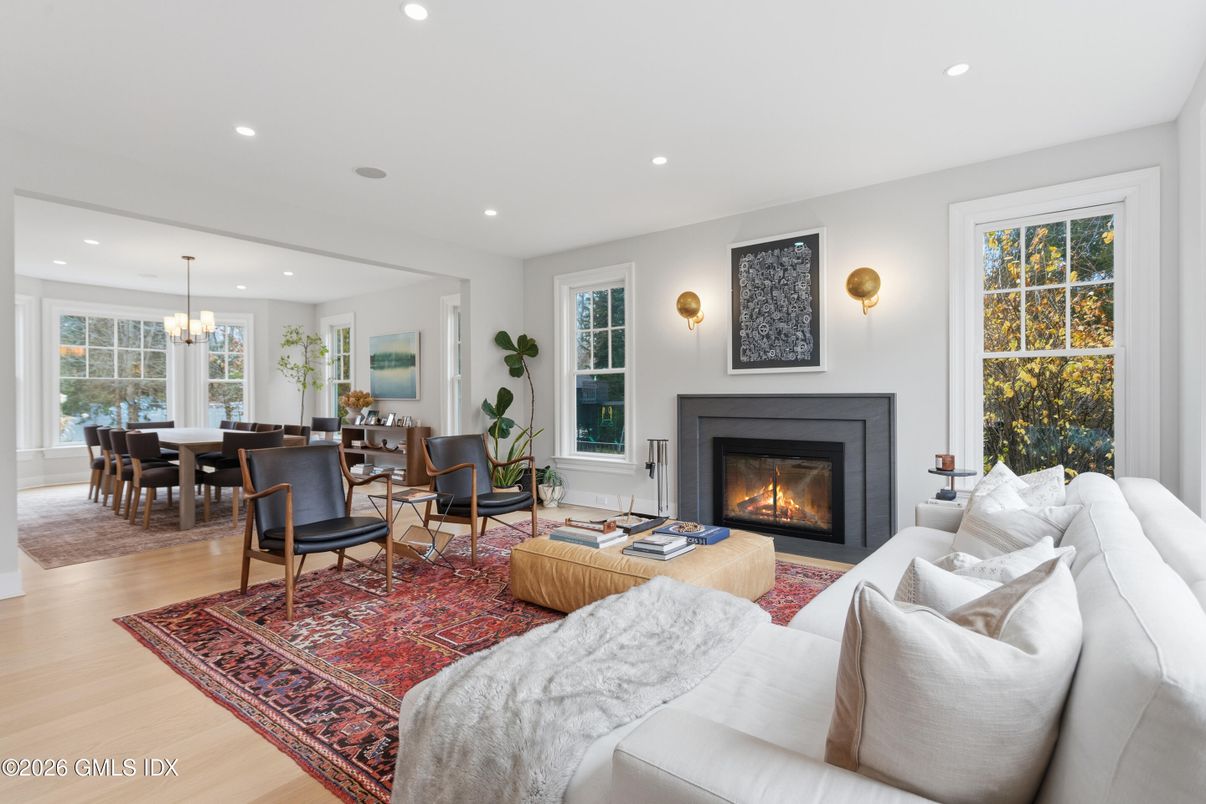 Chandelier, Dining room, Fireplace, Interior, Living room, Recessed Lighting, Wood Texture Flooring