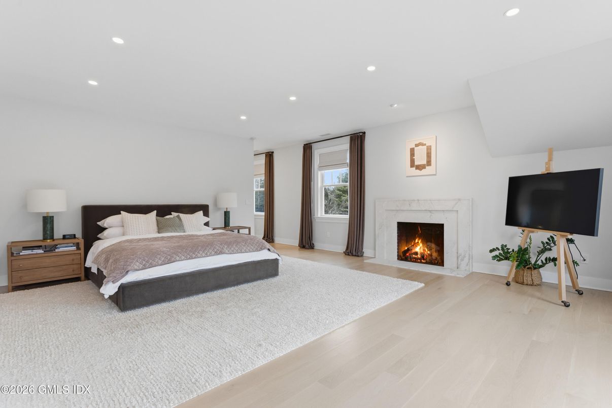 Bedroom, Fireplace, Interior, Recessed Lighting, Wood Texture Flooring
