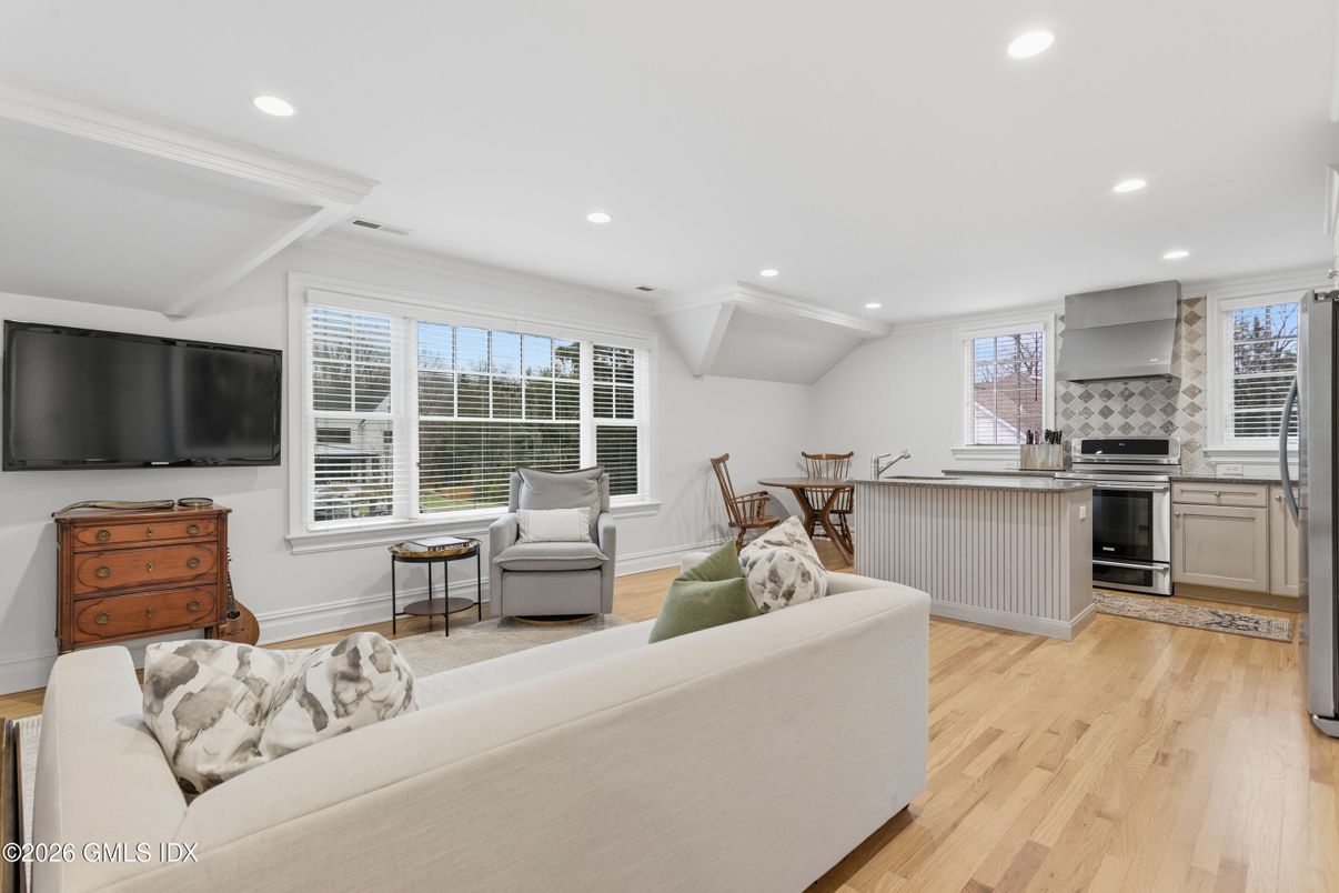 Dining room, Interior, Kitchen, Living room, Recessed Lighting, Stainless Steel Appliances, Wood Texture Flooring