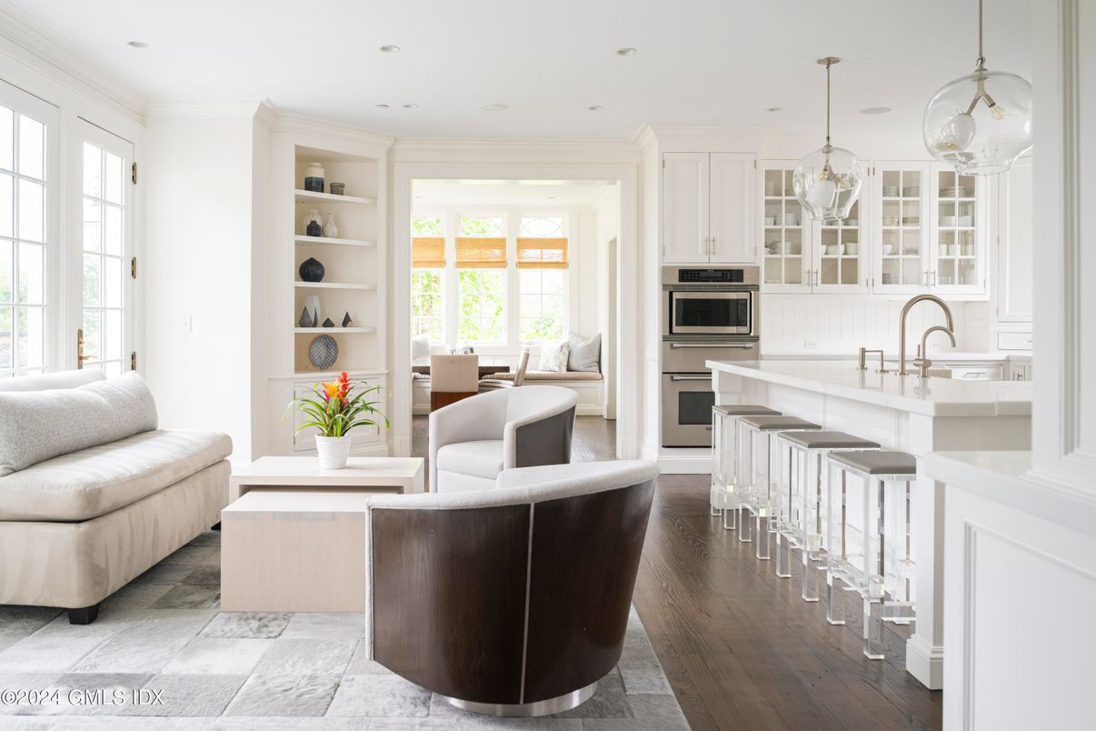 Dining room, Interior, Kitchen, Pendant Lights, Recessed Lighting, Stainless Steel Appliances, Wood Texture Flooring
