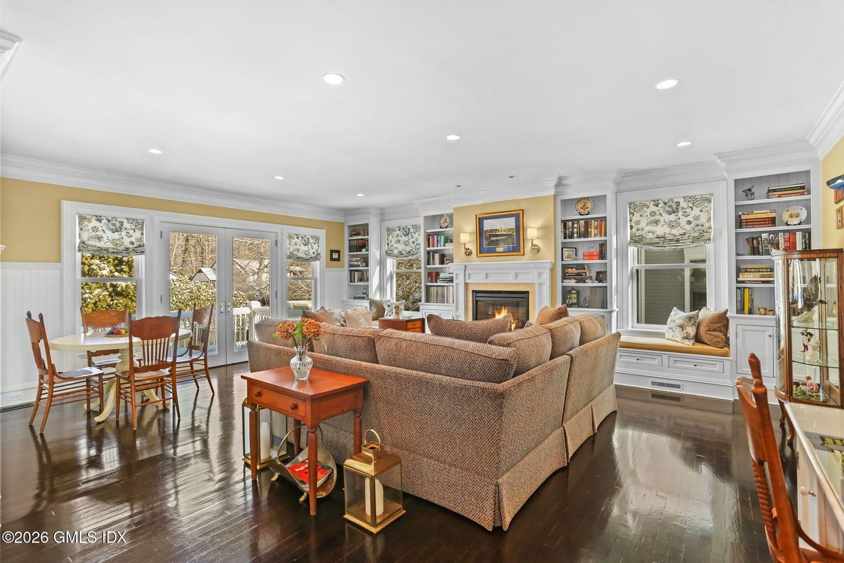 Dining room, Fireplace, Interior, Living room, Recessed Lighting, Wood Texture Flooring
