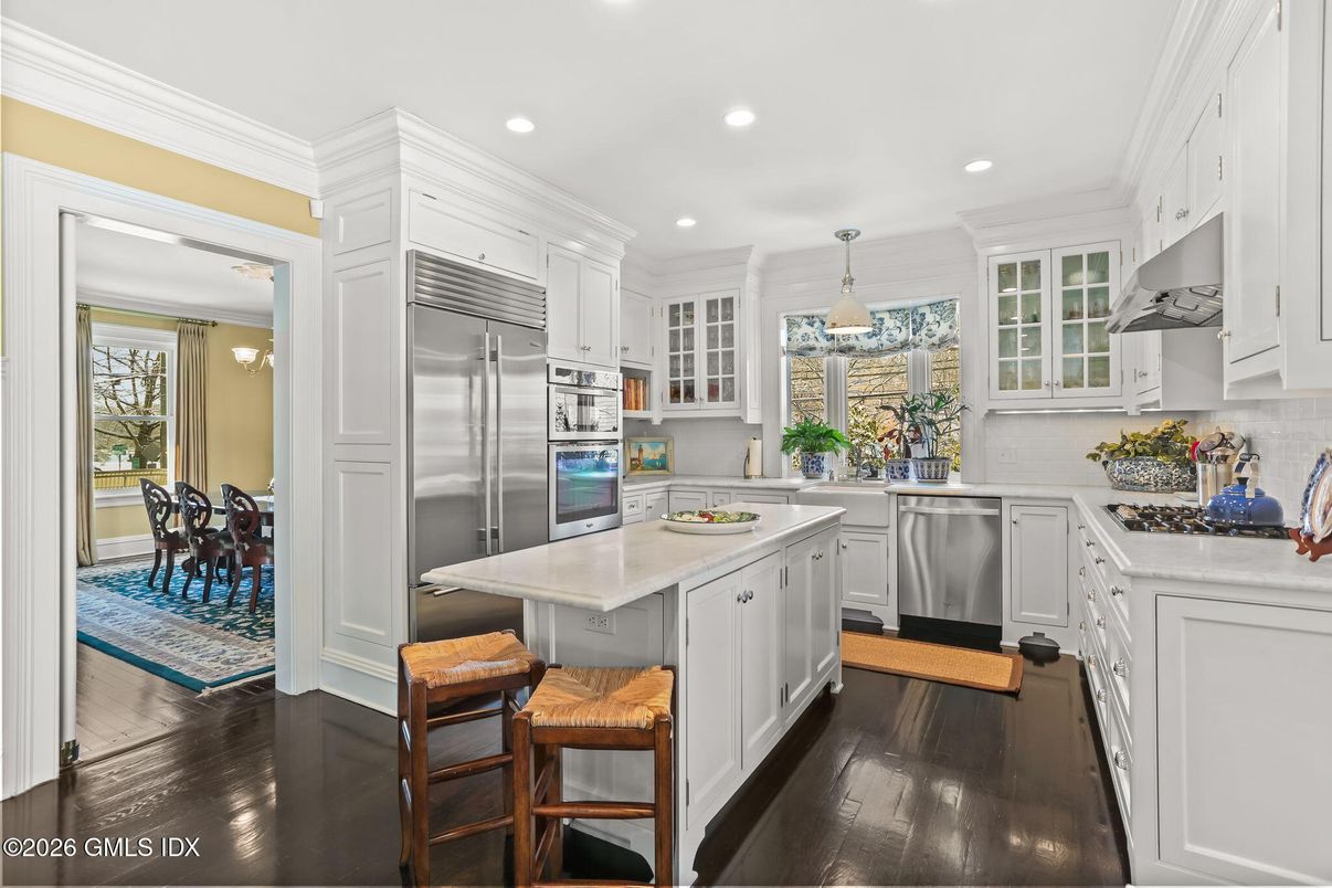 Dining room, Interior, Kitchen, Pendant Lights, Recessed Lighting, Stainless Steel Appliances, Wood Texture Flooring